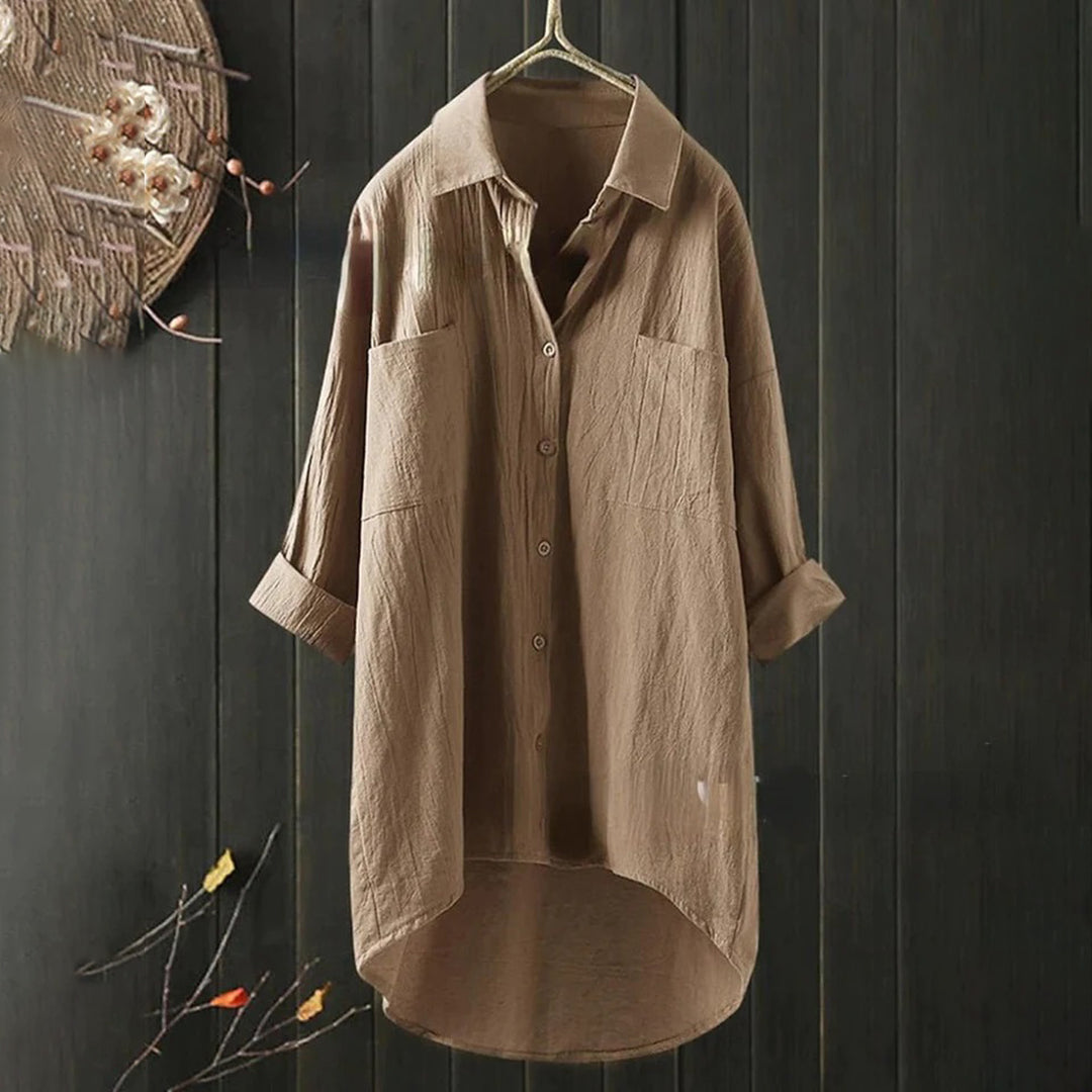 Blusa oversize con cuello redondo y mangas largas, cómoda y moderna para mujer.