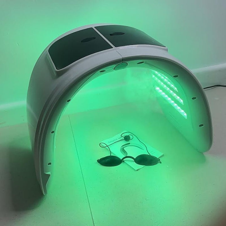 Dispositivo de fototerapia facial con 7 colores, mejora la firmeza y reduce poros.