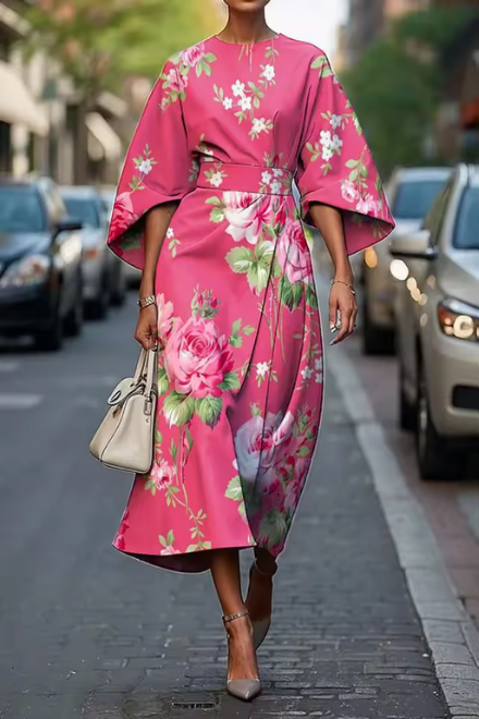 Vestido midi de verano para mujer con flores artísticas. Diseño fluido, elegante y colorido, perfecto para fiesta o casual.