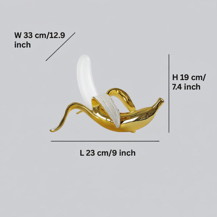 Lámpara de diseño divertido con forma de banana. Ideal como luz de ambiente o para decoración de escritorio moderna.