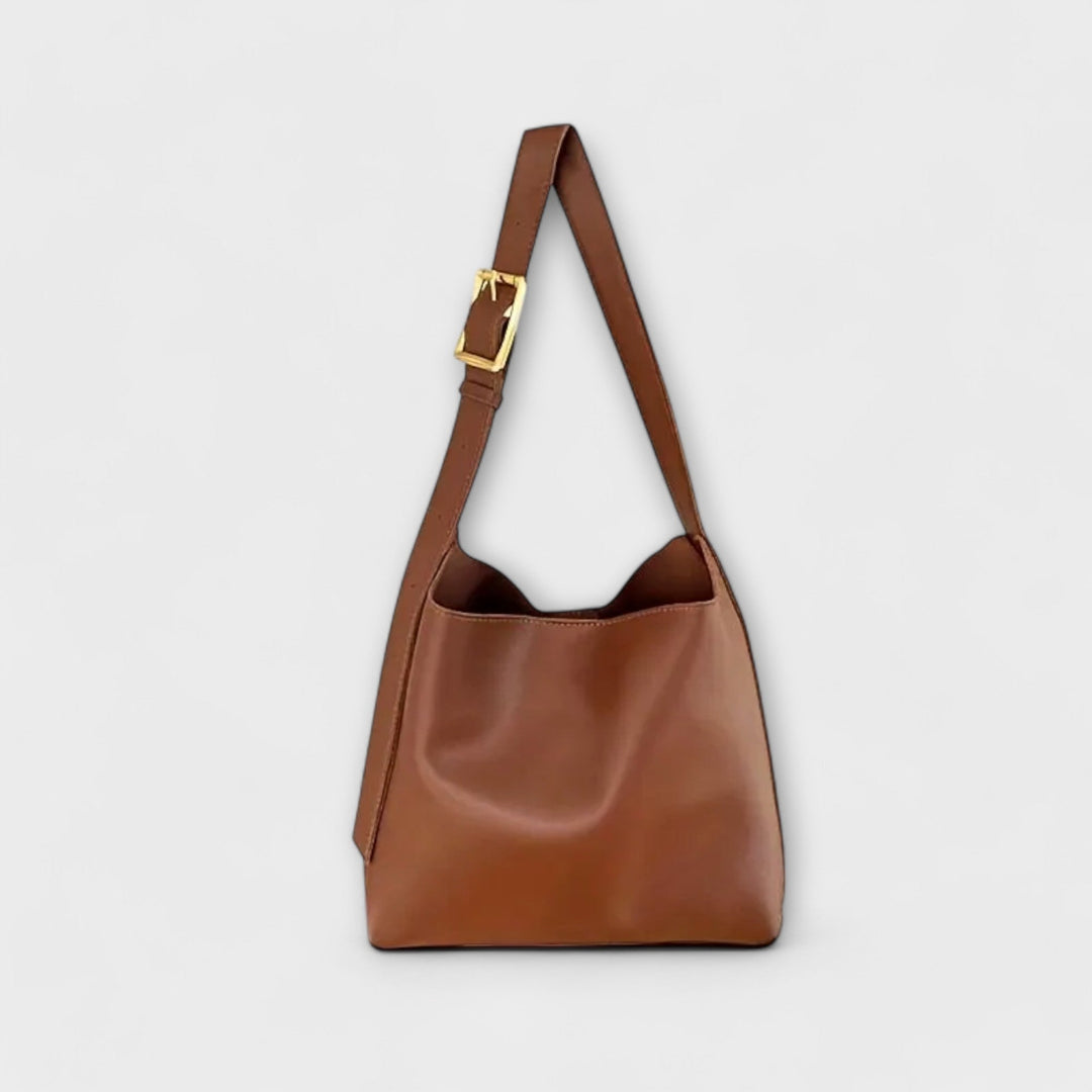 Bolso de hombro de piel ajustable para mujer, ideal para uso diario, disponible en marrón y negro.