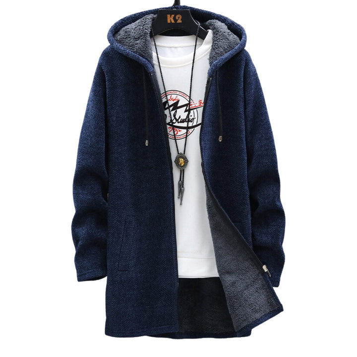 Prenda de abrigo larga con capucha ajustable para mujer. Estilo casual y chic, perfecta para looks de moda diaria.