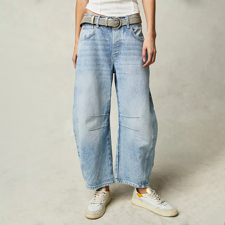 Jeans anchos y cómodos para mujer, color azul oscuro, estilo fluido y moderno de cintura alta.