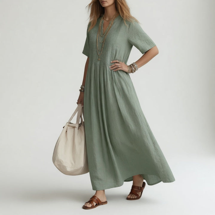 Vestido maxi fluido y elegante de algodón con cuello V. Perfecto para ropa fresca y moda femenina.
