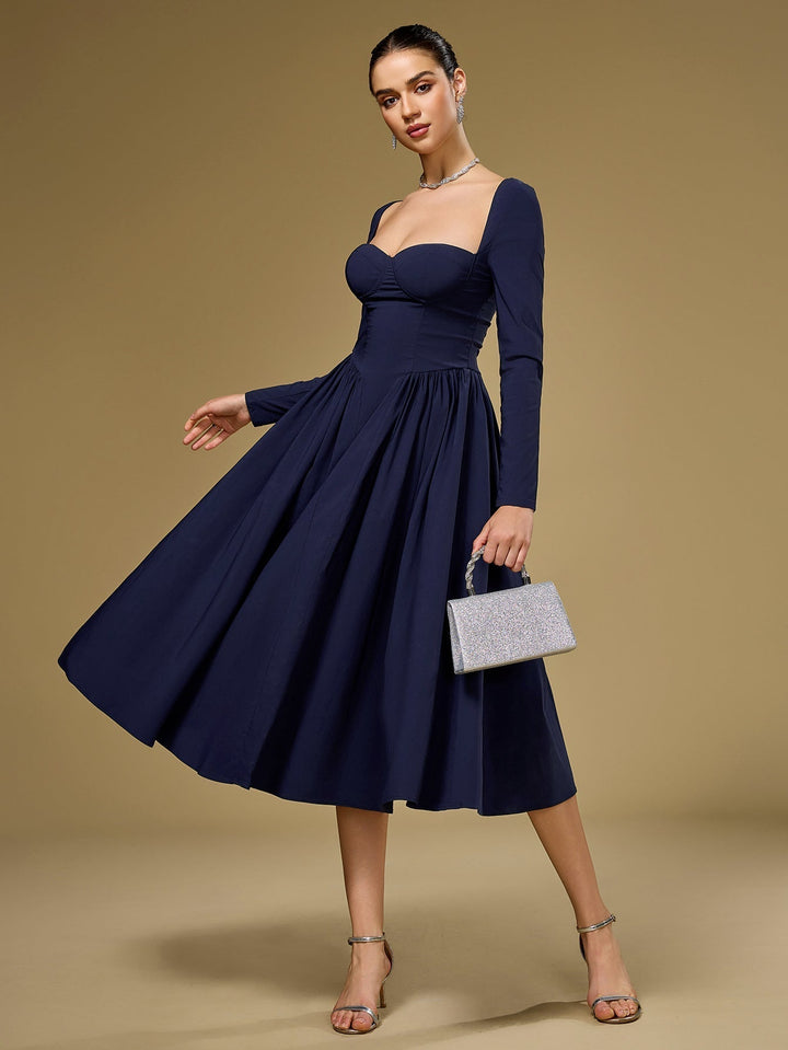 Vestido versátil, línea A, lazo espalda, manga larga. Perfecto para día y noche.