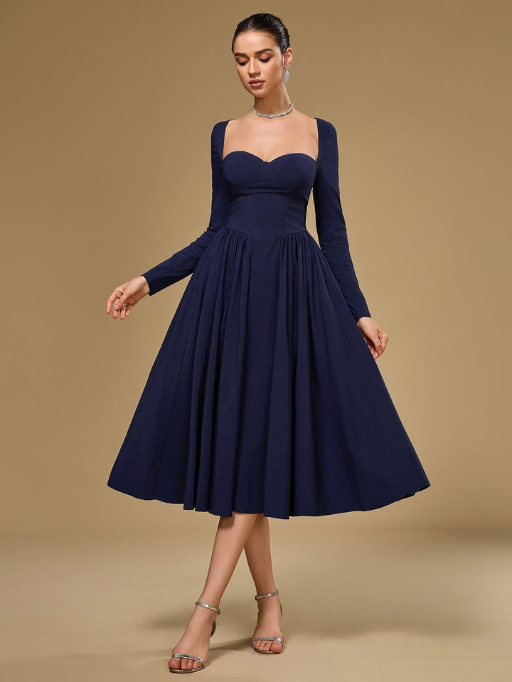 Vestido de moda línea A, manga larga, lazo espalda. Estilo que cautiva.