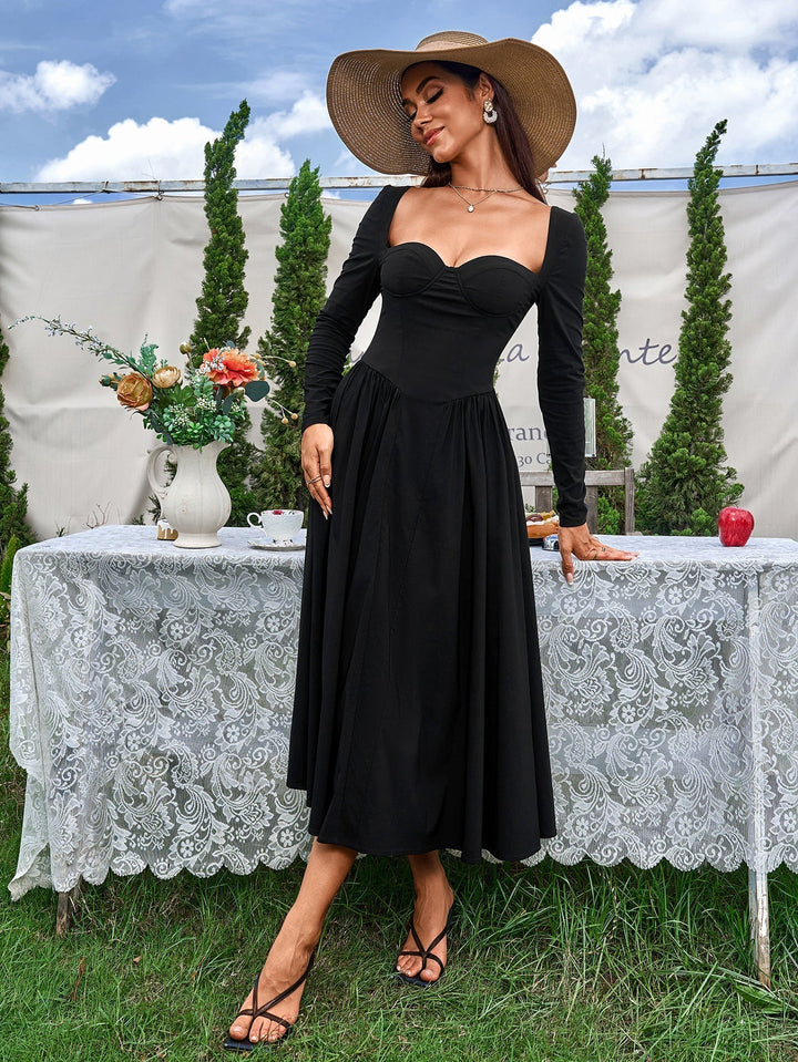 Vestido línea A, manga larga. Lazo en espalda; pieza clave para tu estilo diario.