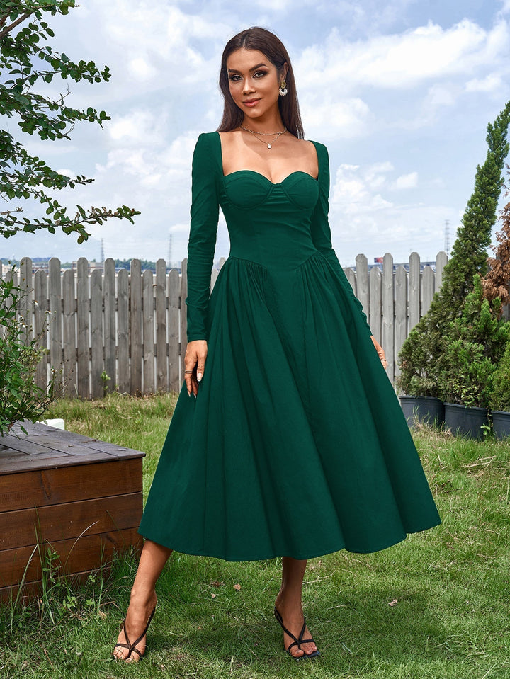 Vestido de moda línea A, manga larga, lazo en espalda; estilo femenino y chic.