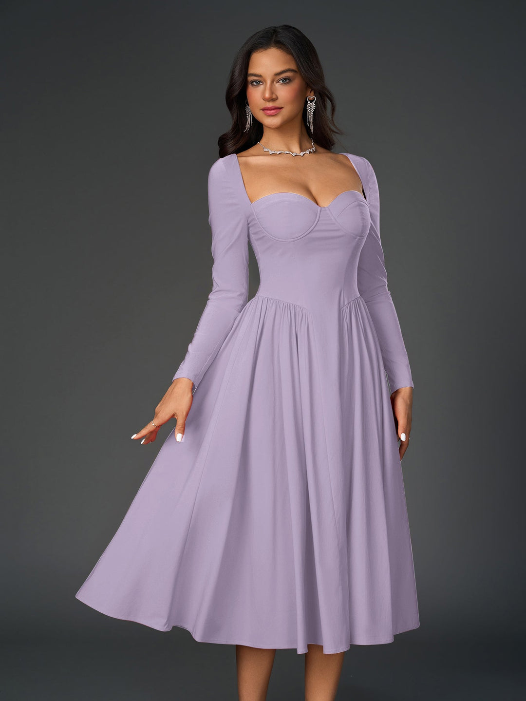 Vestido línea A con lazo trasero, manga larga. Silueta favorecedora para todas.