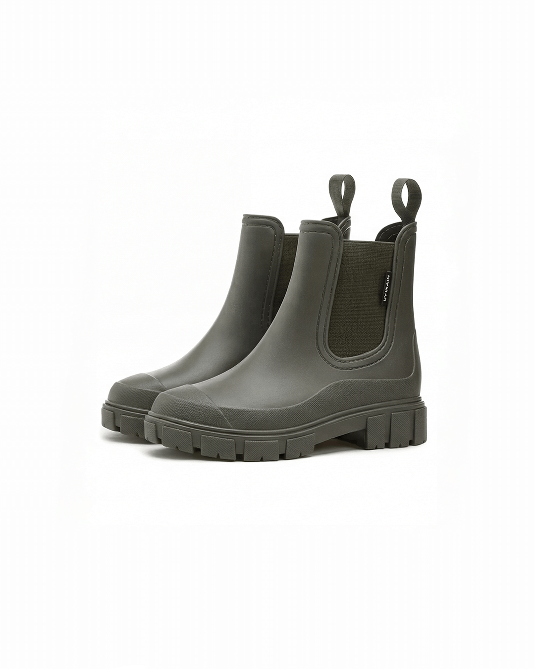 Botines de lluvia estilo Chelsea para mujer, con suela track gruesa. Elegantes y funcionales para el mal tiempo.