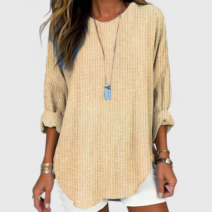 Top blusa de manga larga rayada para mujer con cuello V, diseño moderno y sofisticado. Ideal para outfits de primavera-verano.