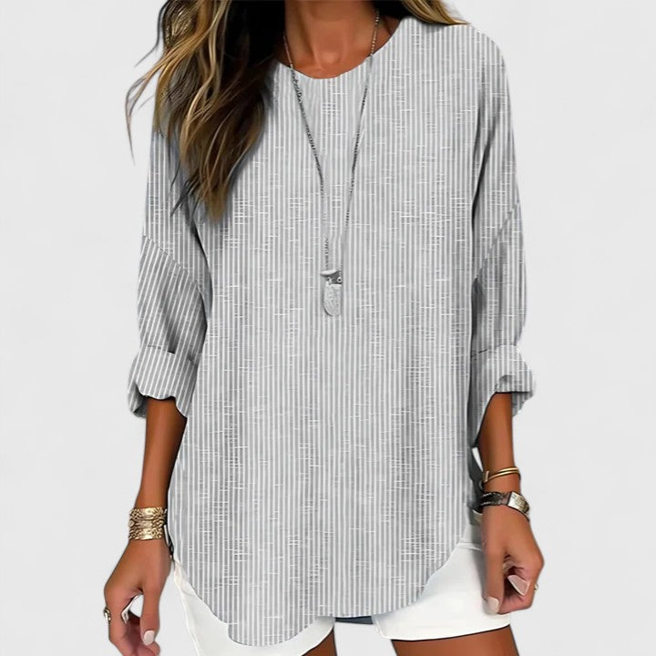 Blusa casual rayada con cuello en V para mujer, manga larga. Prenda versátil y elegante para el día a día o eventos de primavera.