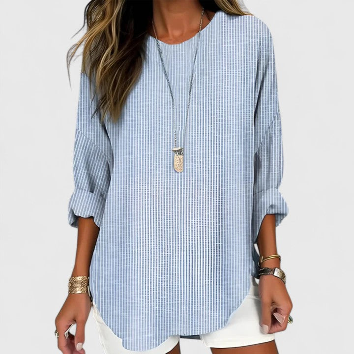 Blusa rayada elegante de mujer, manga larga y cuello V. Top versátil perfecto para looks casuales o de oficina en primavera.
