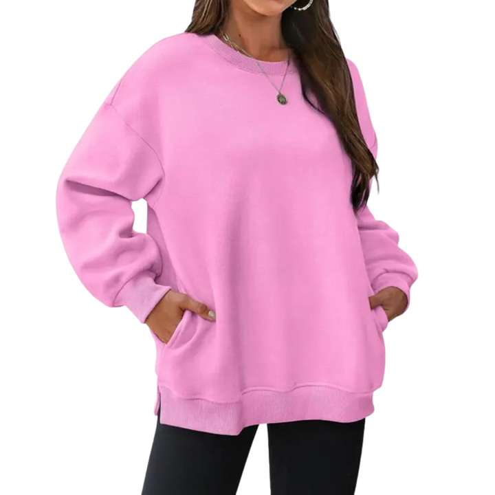 Sudadera de mujer estilo oversize, casual y moderna, con bolsillos y manga larga. Ideal para tu día a día.