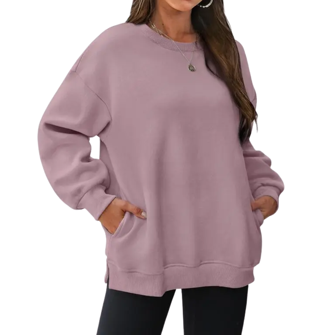 Sudadera oversize casual para mujer, cómoda y con bolsillos. Estilo relajado para look moderno.