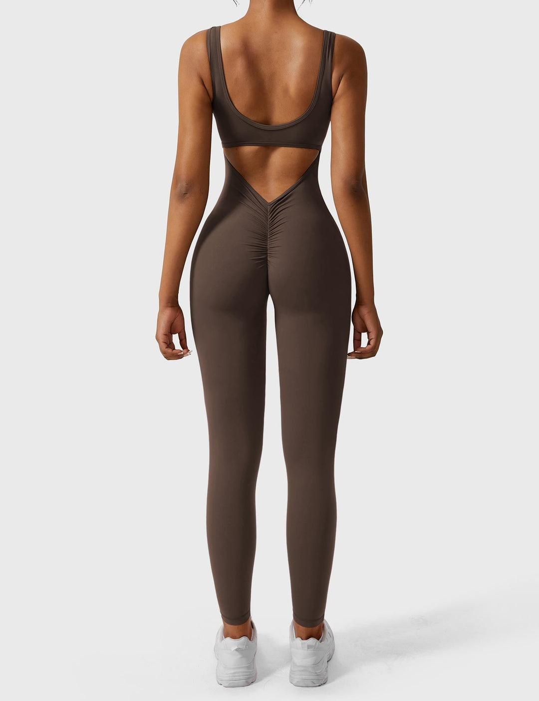 Jumpsuit casual negro para mujer, espalda en V, tejido elástico, perfecto para el día a día.