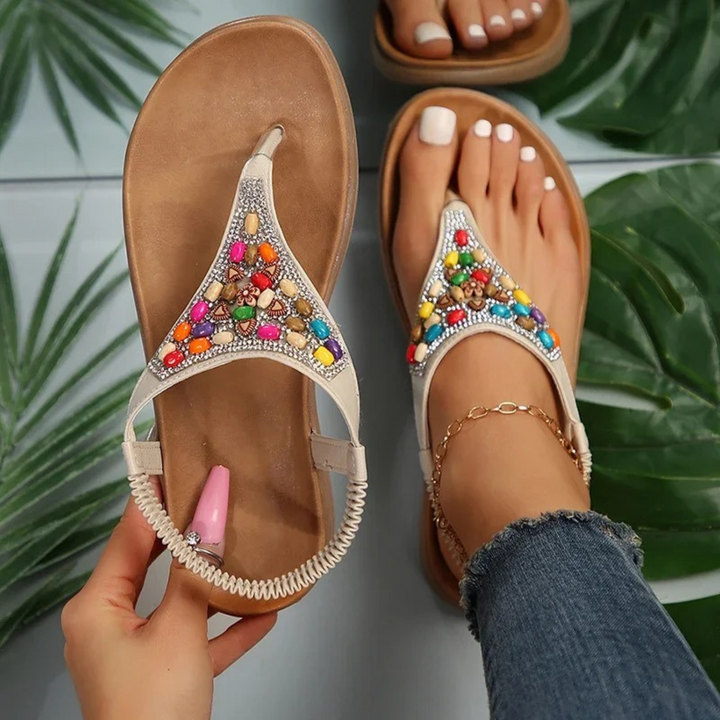 Sandalias planas retro con cuentas, un must-have para mujer: comodidad, estilo y toque bohemio.