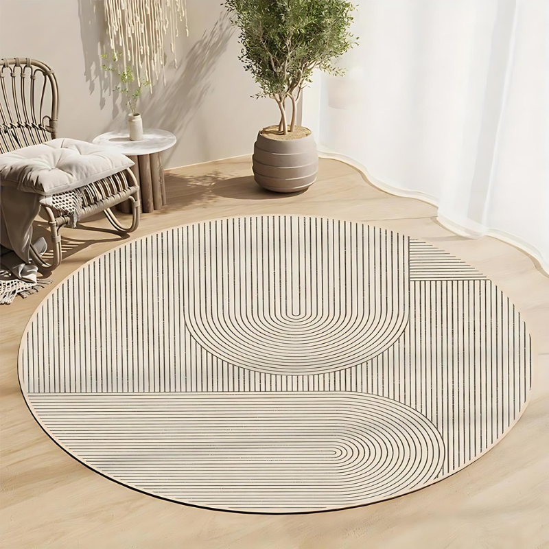 Ambiente con alfombra redonda elegante, diseño minimalista que brinda calidez y seguridad antideslizante.