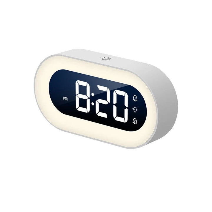 Despertador digital blanco con luz suave LED y sonidos relajantes. Ideal para dormitorio y hogar.