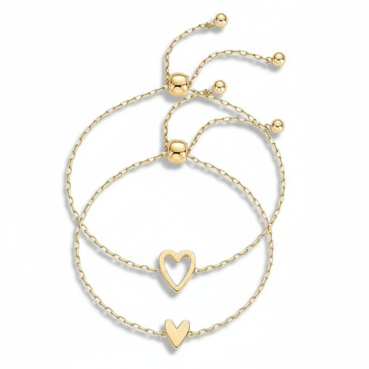Pulsera de cadena ajustable con dije de corazón, ideal para parejas. Diseño minimalista unisex en dorado o plateado.