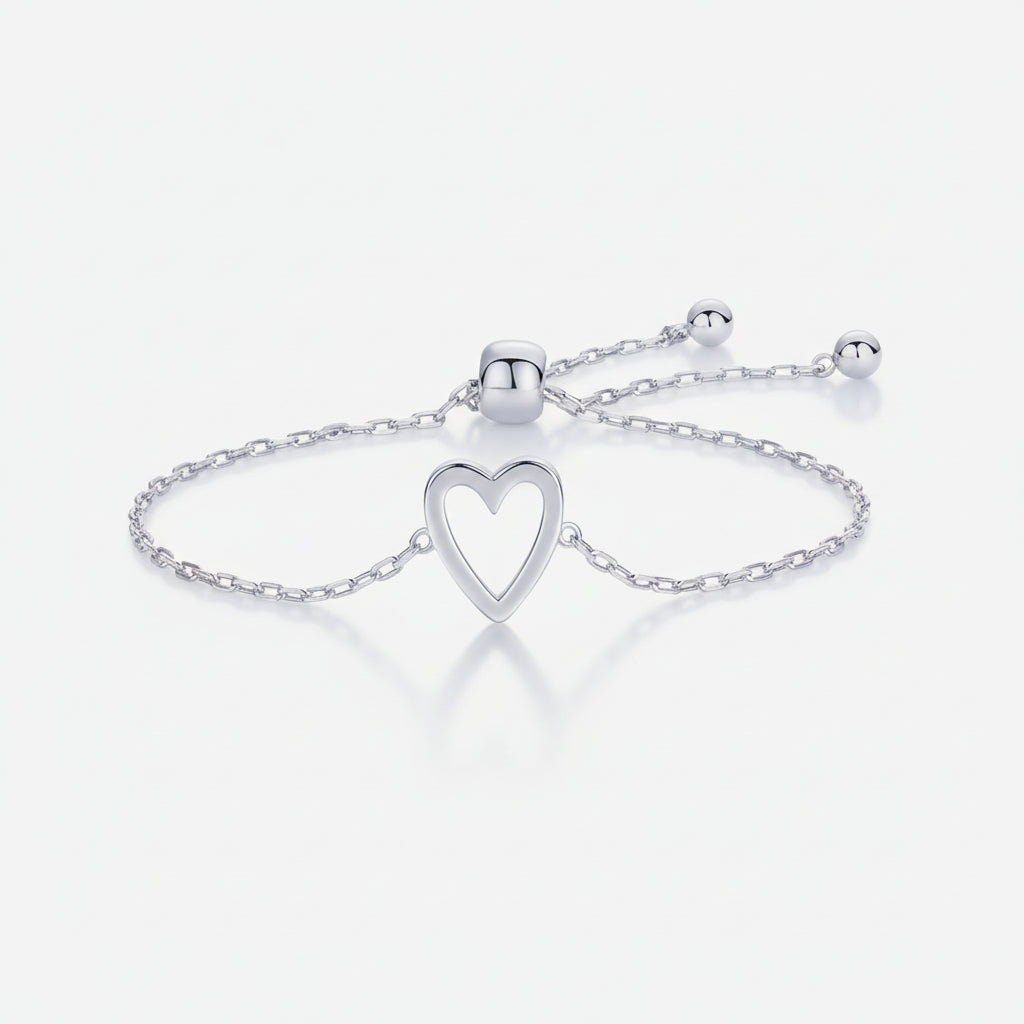 Pulsera dorada de cadena con corazón, ajustable para él y ella. Accesorio minimalista unisex, regalo ideal para parejas.