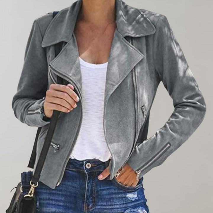 Chaqueta asimétrica con cremallera, diseño moderno y audaz para mujer.