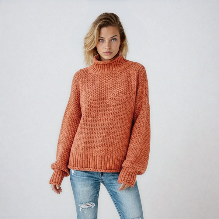 Jersey de mujer con cuello alto, cálido y elegante para invierno. Moda femenina casual de manga larga.