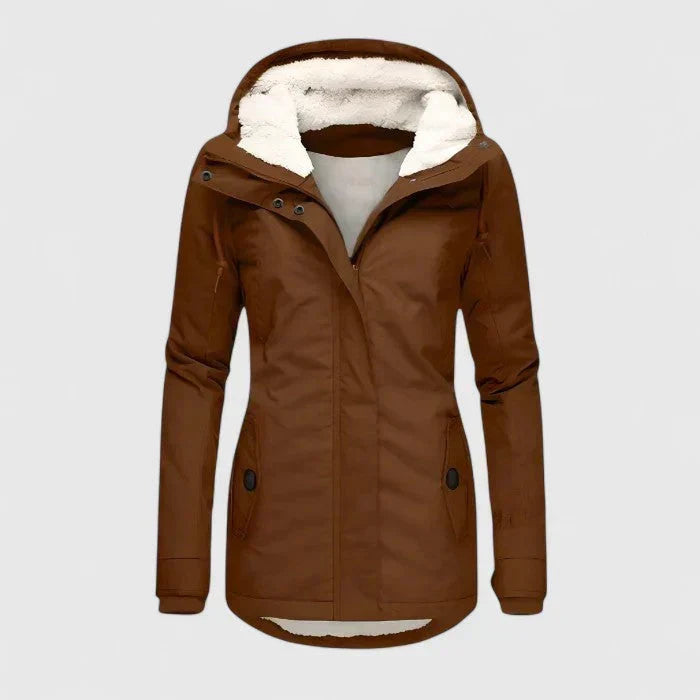 Chaqueta impermeable de mujer para otoño-invierno. Protección lluvia, ropa exterior elegante y cómoda.