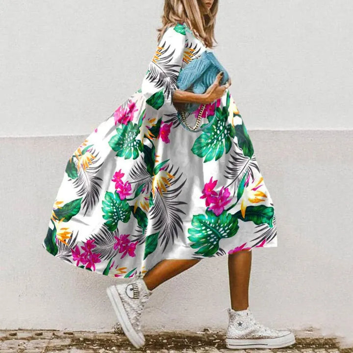 Moda femenina: Vestido midi holgado bohemio con mangas abullonadas. Estilo elegante y casual para verano.