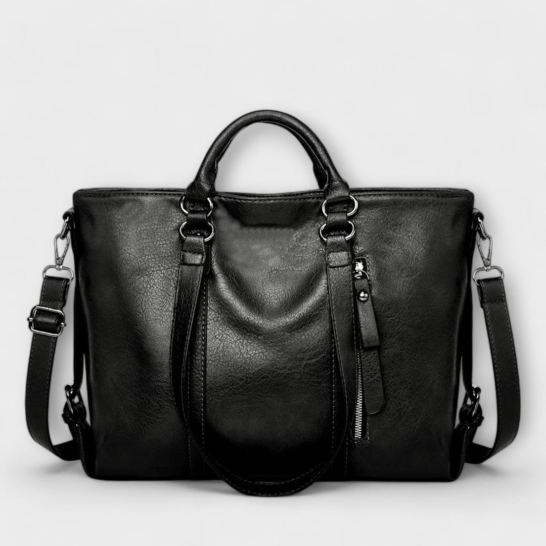 Elegante bolso tote de mujer en piel sintética, diseño moderno y versátil. Accesorio de moda para tu look diario.