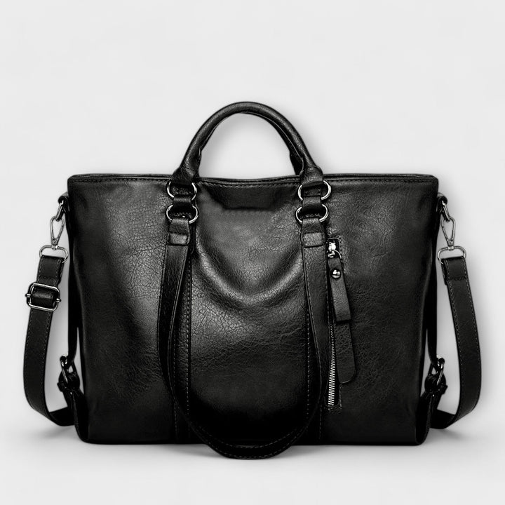 Elegante bolso tote de mujer en piel sintética, diseño moderno y versátil. Accesorio de moda para tu look diario.