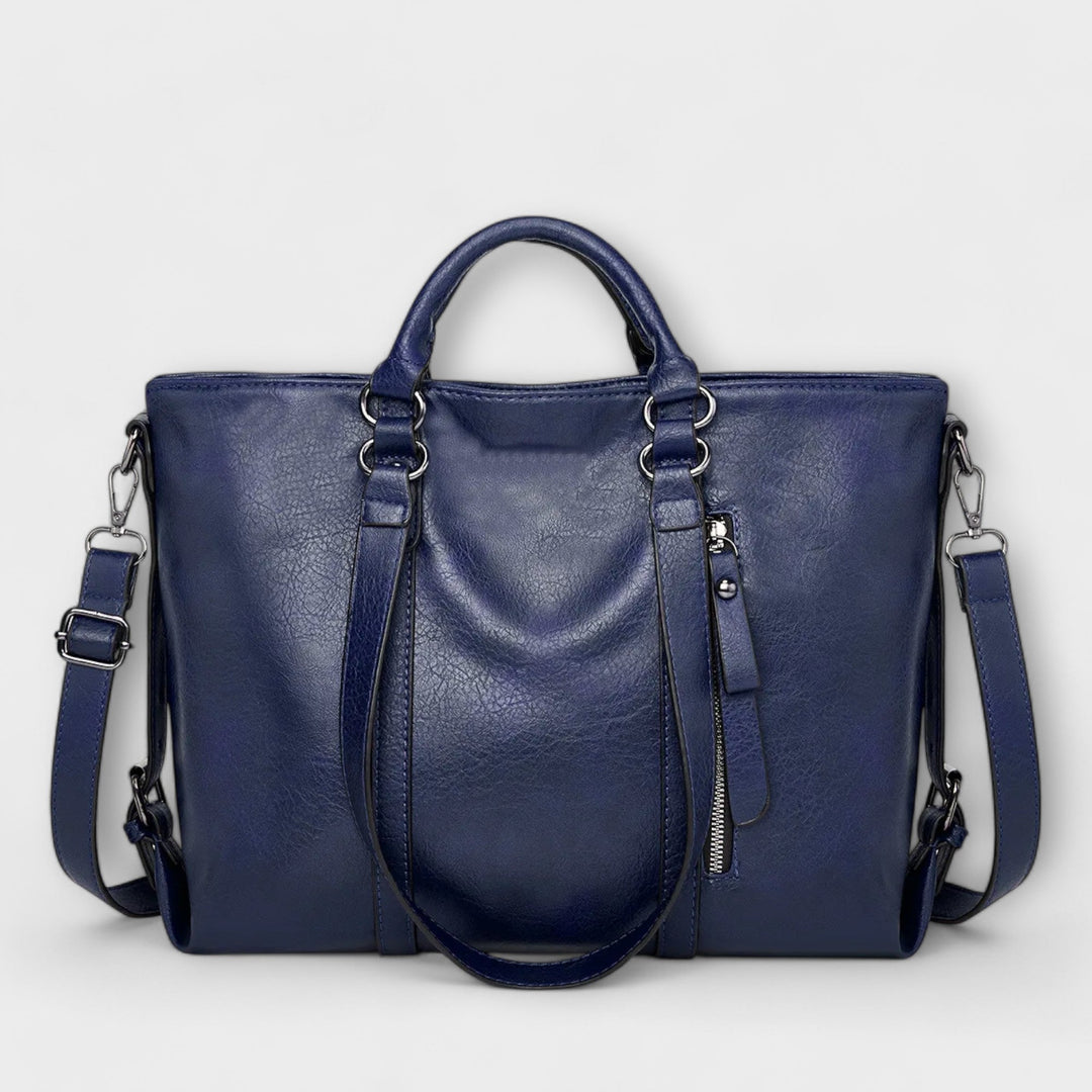 Bolso tote casual de mujer con cremallera segura y asas cómodas. Perfecto para llevar tus esenciales con estilo.