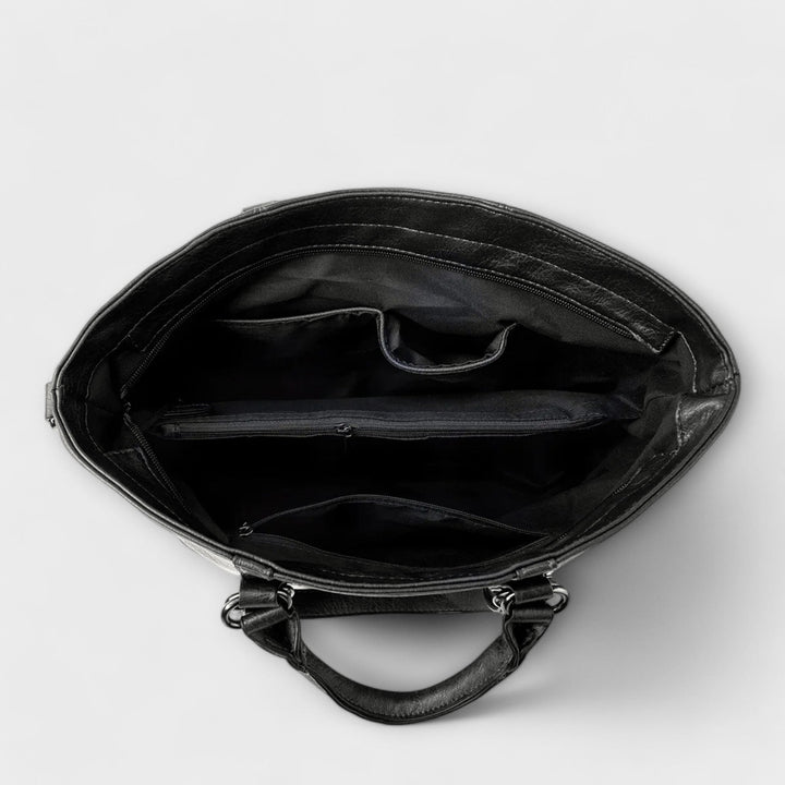 Bolso tote de mujer en piel sintética, versátil para cualquier ocasión. Estilo, cremallera y bandolera para tu día a día.