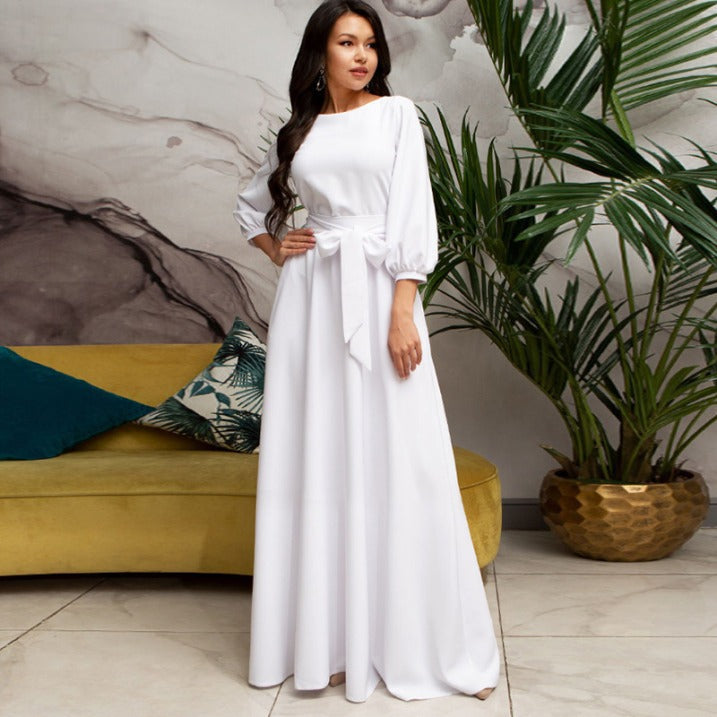 Vestido elegante de mujer con mangas largas, perfecto para fiesta, ceremonia o evento formal sofisticado.