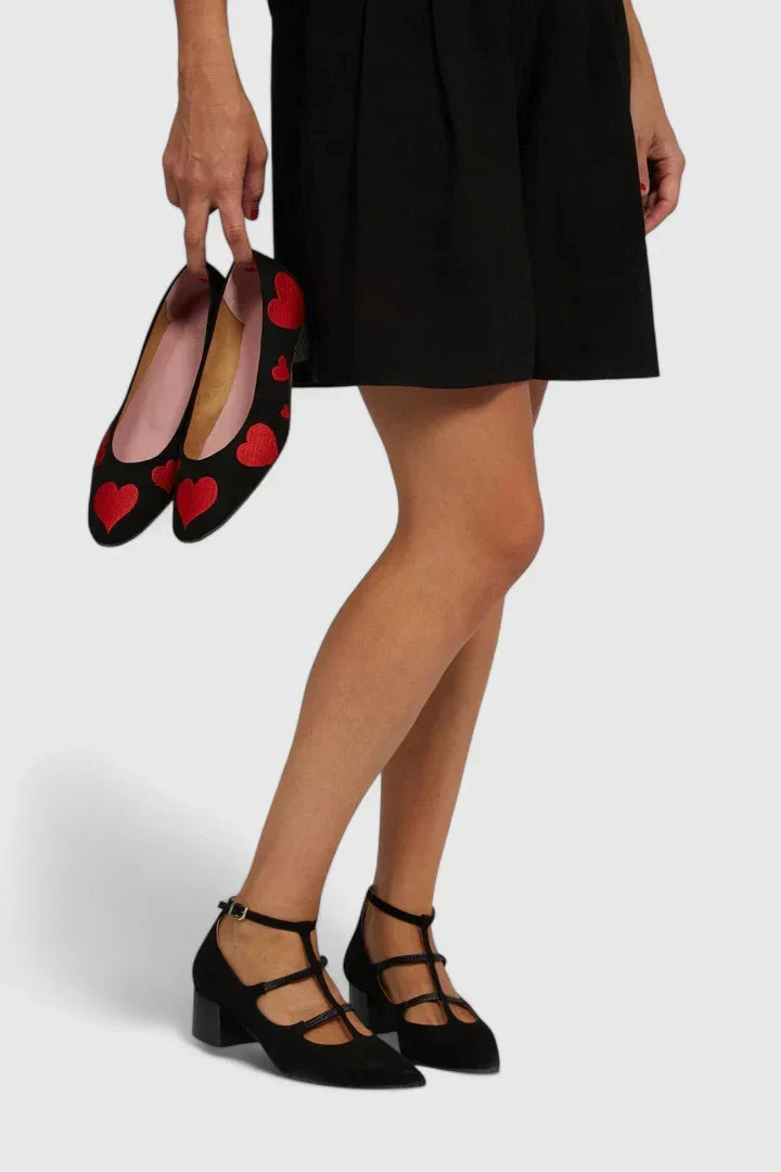 Vista superior de cómodos zapatos planos Mary Jane T-Strap de mujer, ideales para uso diario o eventos.