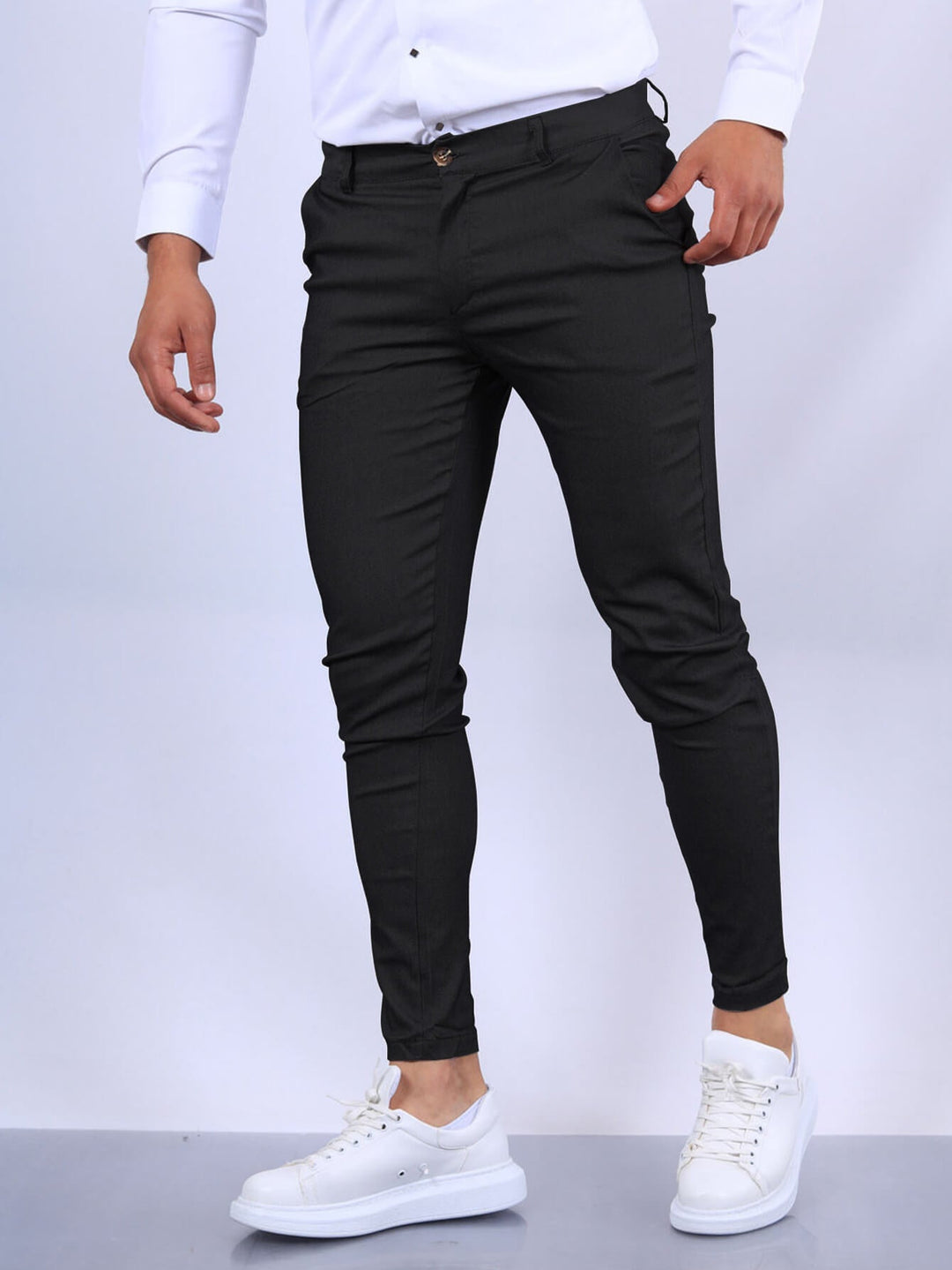 Pantalón elegante elástico de hombre, ideal para oficina o estilo casual. Confort moderno y versátil.