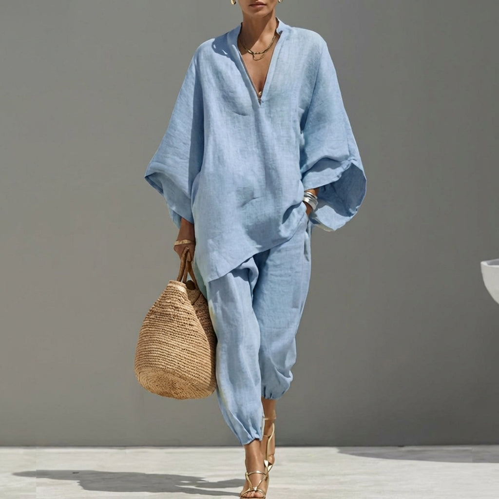 Conjunto femenino de dos piezas: blusa con cuello V y pantalón ancho, diseño casual y transpirable.
