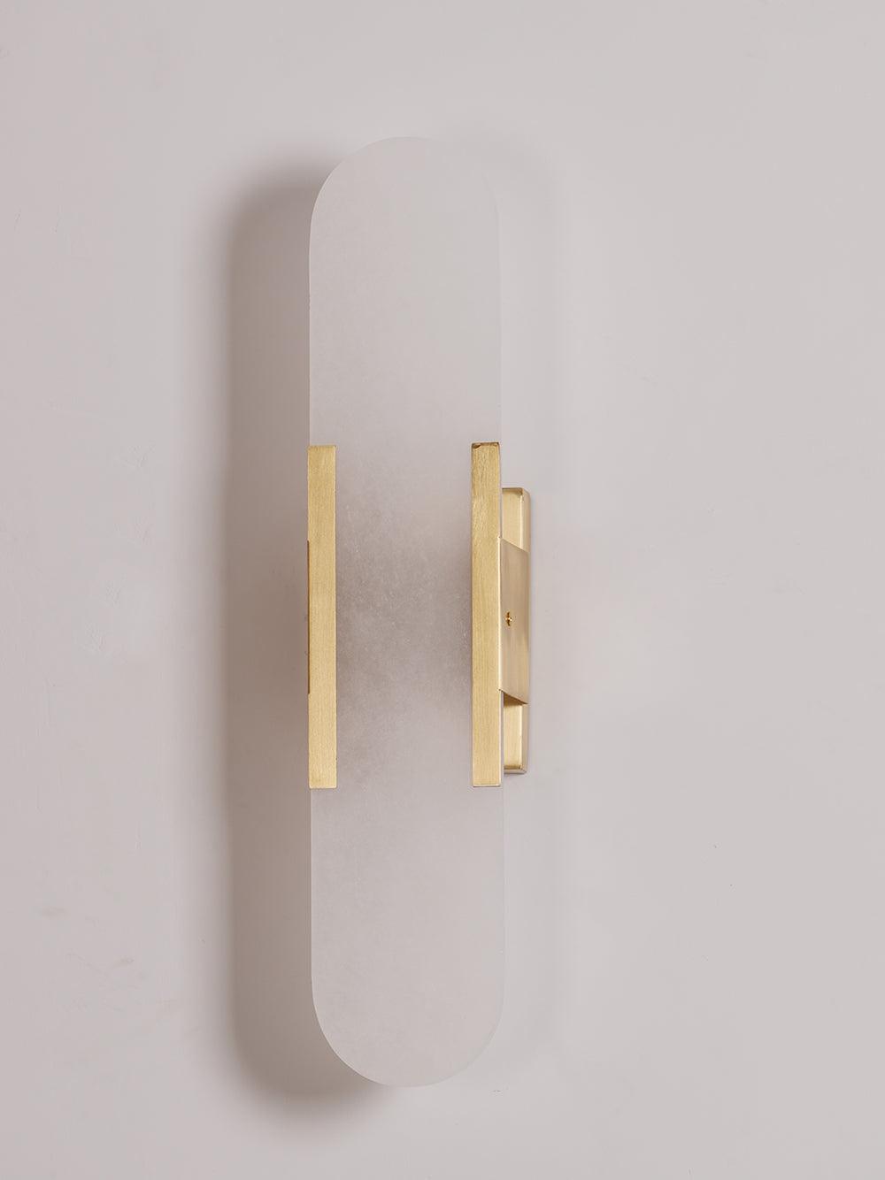 Luminaria LED de pared, mármol, moderno, ideal para iluminar zonas de lectura.