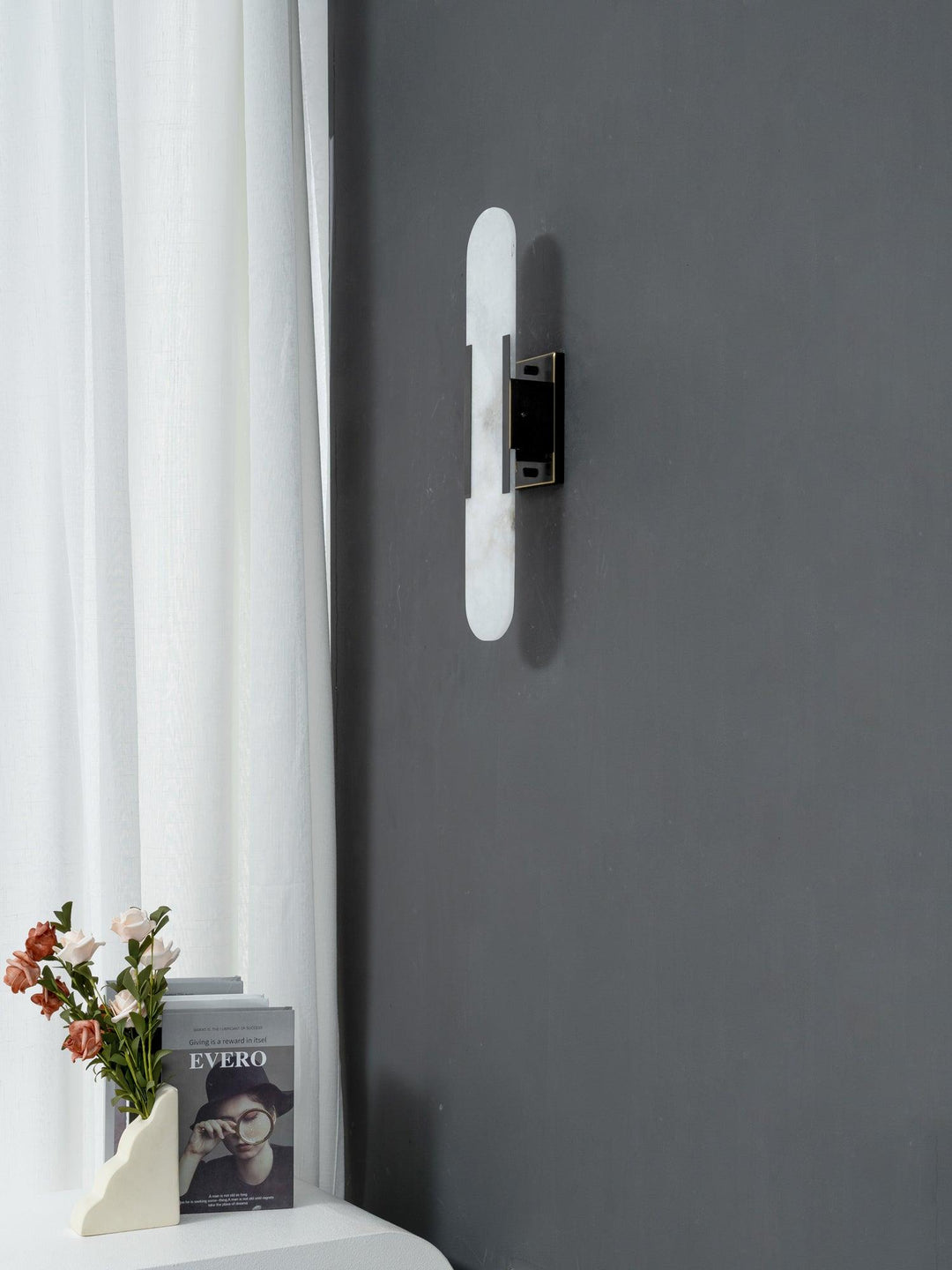 Aplique de pared LED, acabado mármol, moderno, luz cálida para tus espacios.
