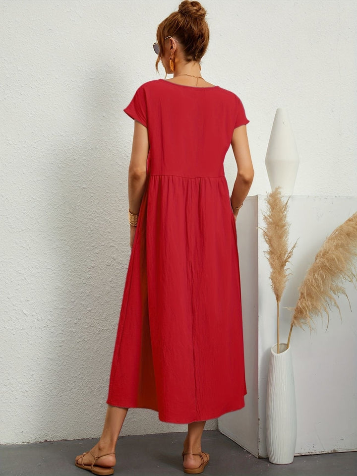 Vestido de lino transpirable para mujer, con caída fluida. Ideal para la moda veraniega y natural.
