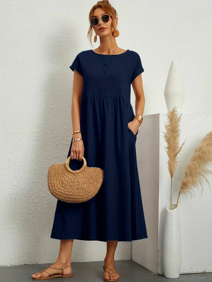 Vestido casual midi fluido de mujer, comodidad elegante para el día.