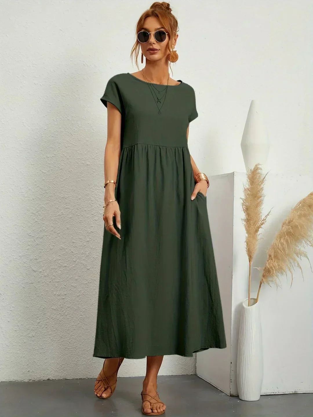 Vestido midi fluido de mujer, ideal para un estilo desenfadado y chic.
