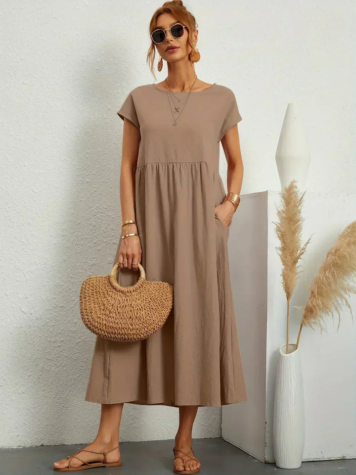 Vestido midi fluido cómodo para mujer, un básico elegante y versátil.