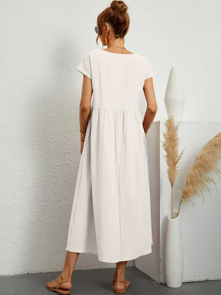 Confort y estilo en este vestido midi fluido para mujer, tendencia.