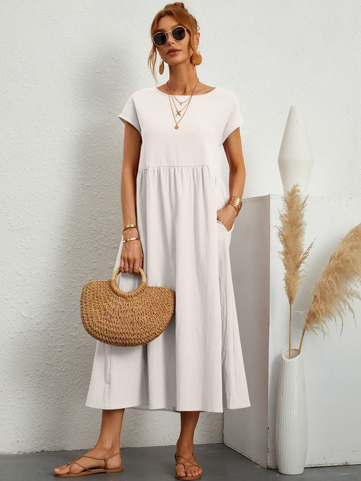 Vestido de lino para mujer con un diseño fluido que aporta confort y un look natural de verano.