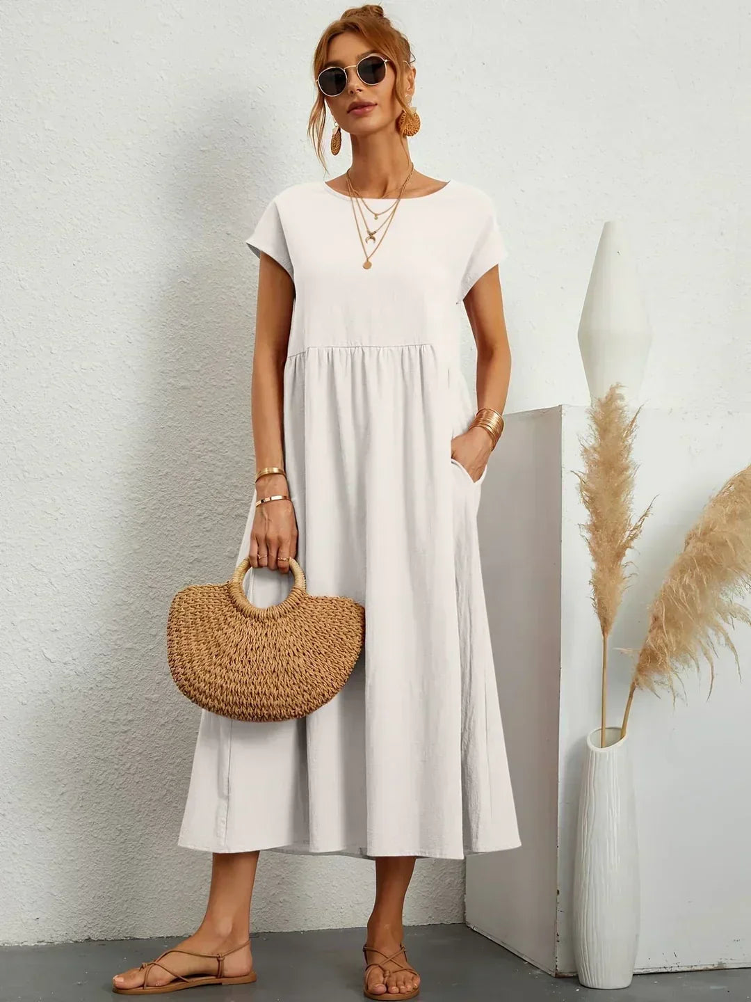 Vestido midi fluido elegante para mujer, estilo y confort veraniego.