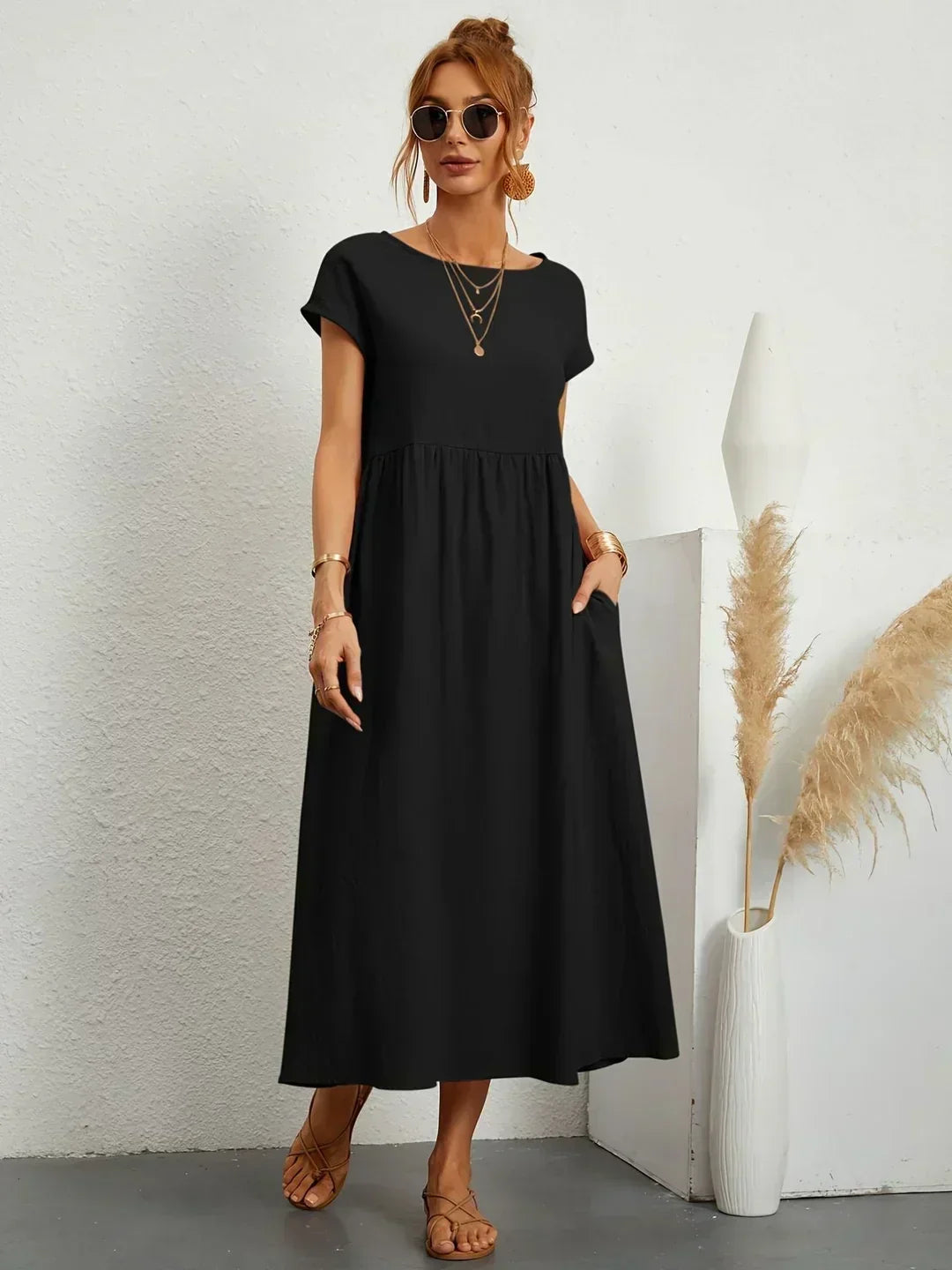 Vestido de mujer, midi y fluido, para un confort sin igual en verano.