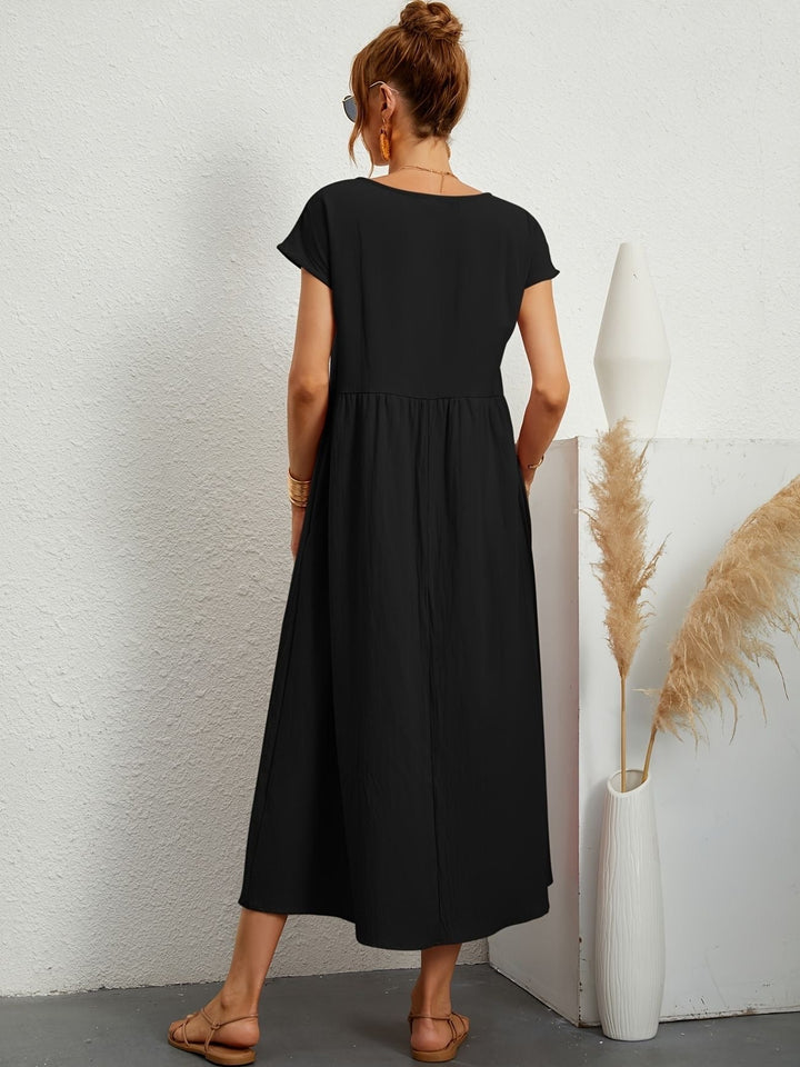 Vestido de lino para mujer en corte fluido, ideal para un look casual de verano. Moda cómoda.
