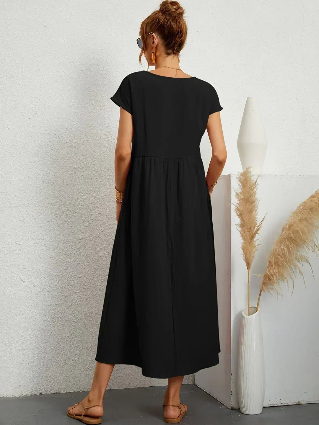 Elegante vestido midi fluido para mujer, suave, ligero y de moda.
