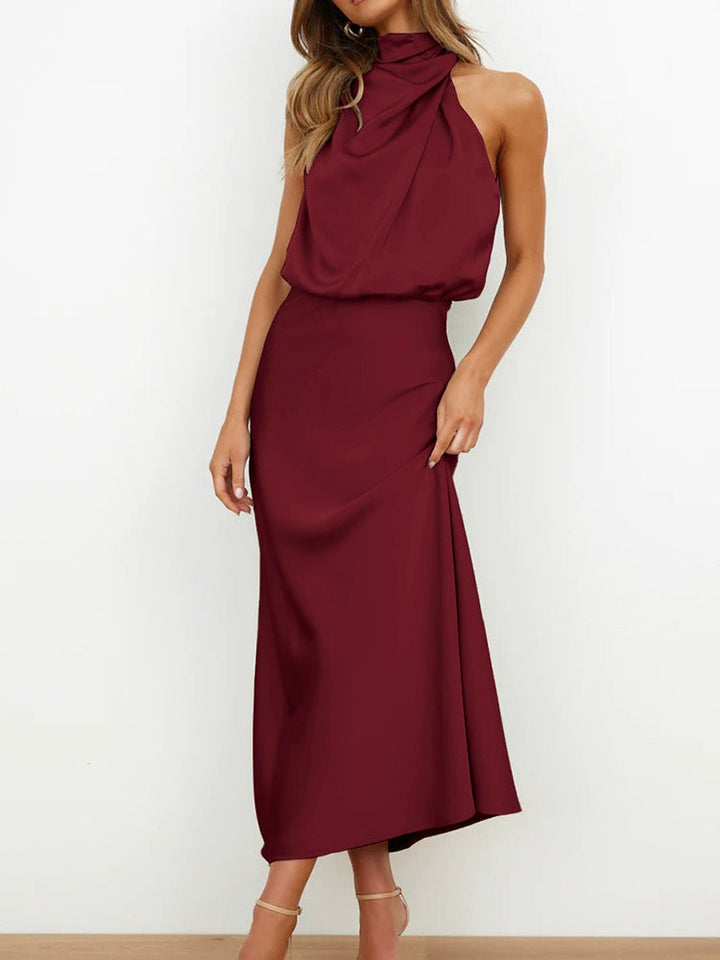Vestido midi sofisticado para mujer con cuello drapeado, ideal para fiesta o cena formal de verano.